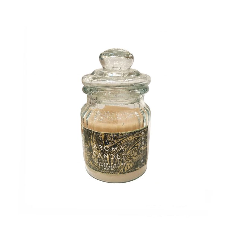 An ivory-colored scented jar candle in a glass jar with a lid and a label attached reading Aroma Candle. Image relates to a product titled: شمع معطر لیوانی وانیل (Vanilla)